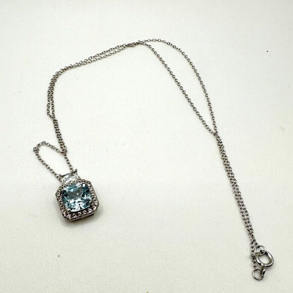 Jewelry - Marked DHJ 925, blue topaz, and CZ accented sterling silver necklace!